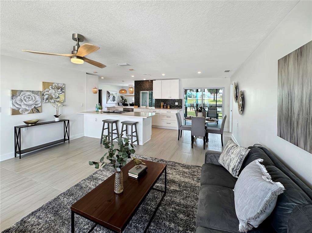 Undisclosed Address Port Richey, FL 34668 - Photo 24 of 44 a living room with furniture