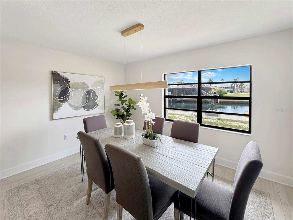 Undisclosed Address Port Richey, FL 34668 - Photo 30 of 44 a dining room with furniture and window