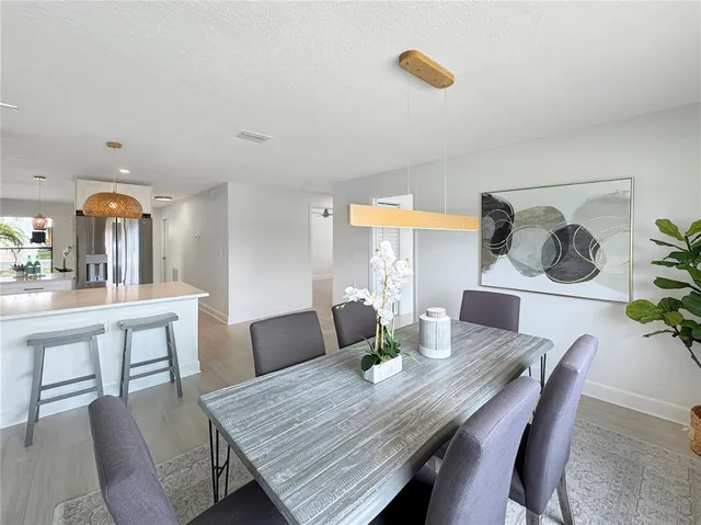 a view of a dining room with furniture