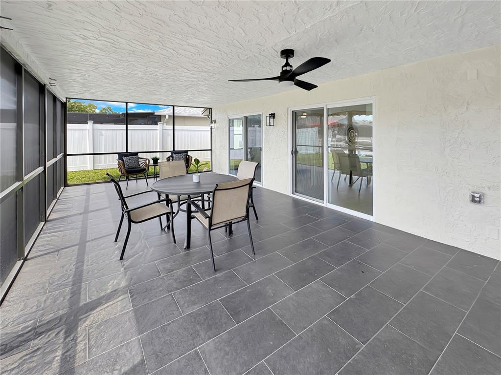 Undisclosed Address Port Richey, FL 34668 - Photo 7 of 44 a dining room with furniture and window