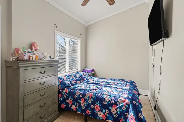 a view of a house with a yard and a wooden deck