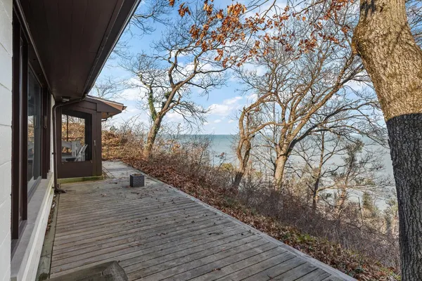 a view of a house with a small yard