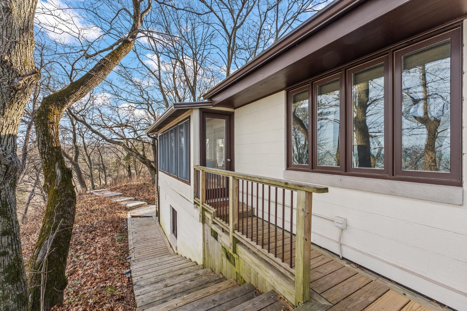 42 Circle Drive Dune Acres, IN 46304 - Photo 12 of 44 a view of a house with a small yard
