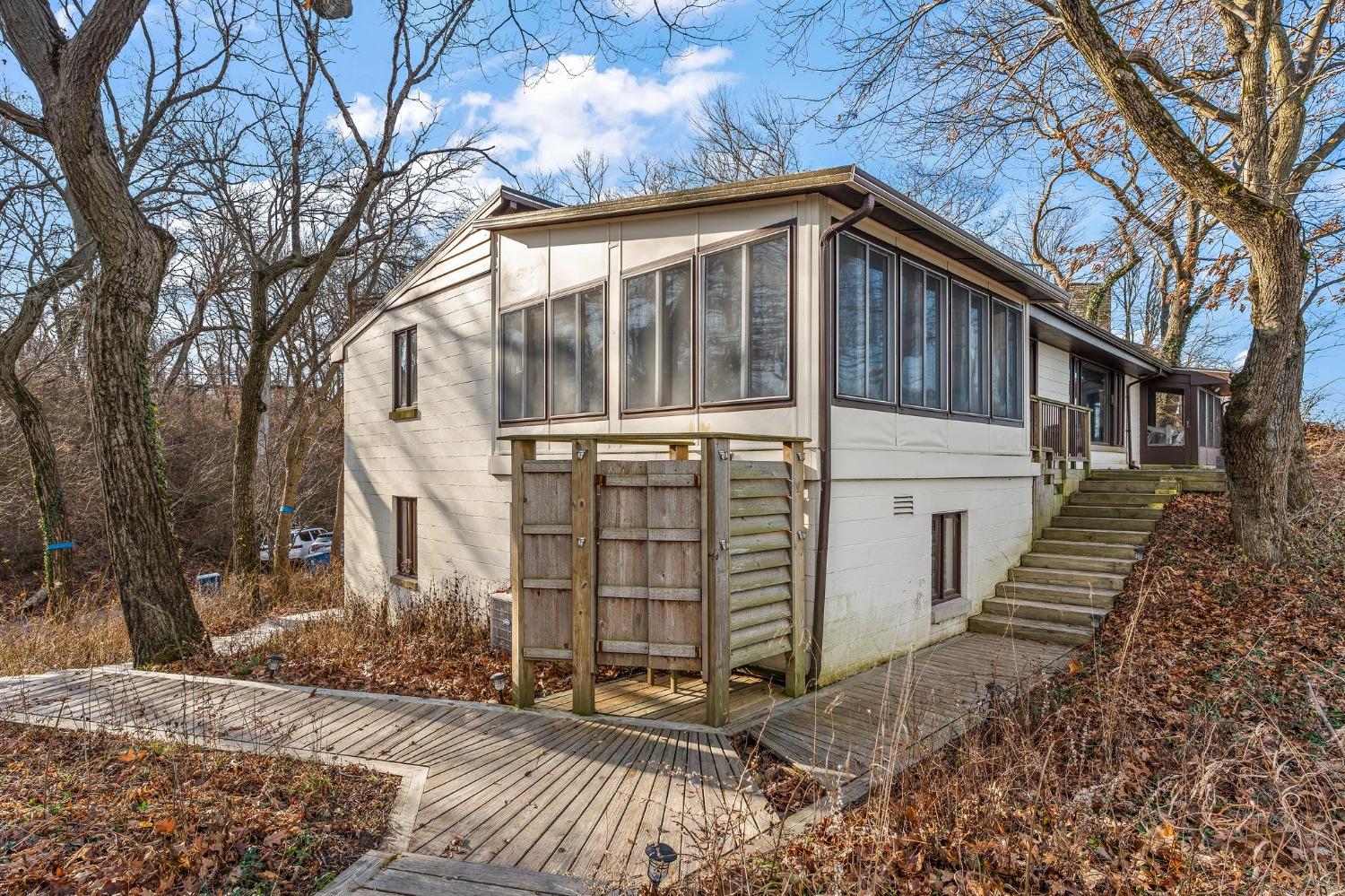 42 Circle Drive Dune Acres, IN 46304 - Photo 14 of 44 a view of a house with a yard