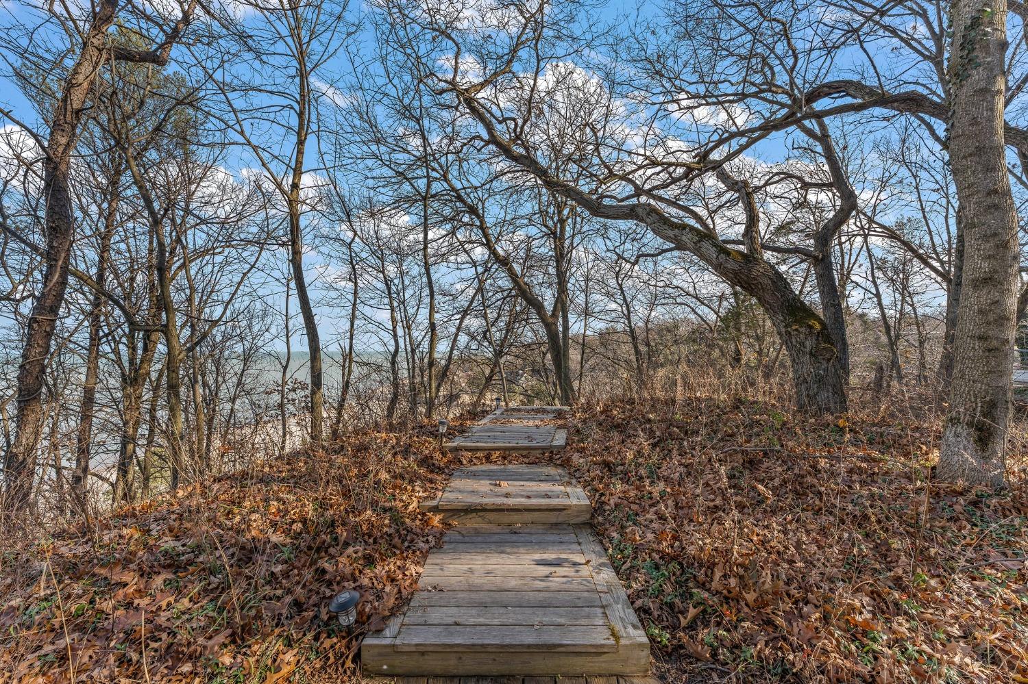 42 Circle Drive Dune Acres, IN 46304 - Photo 15 of 44 a pathway of a yard