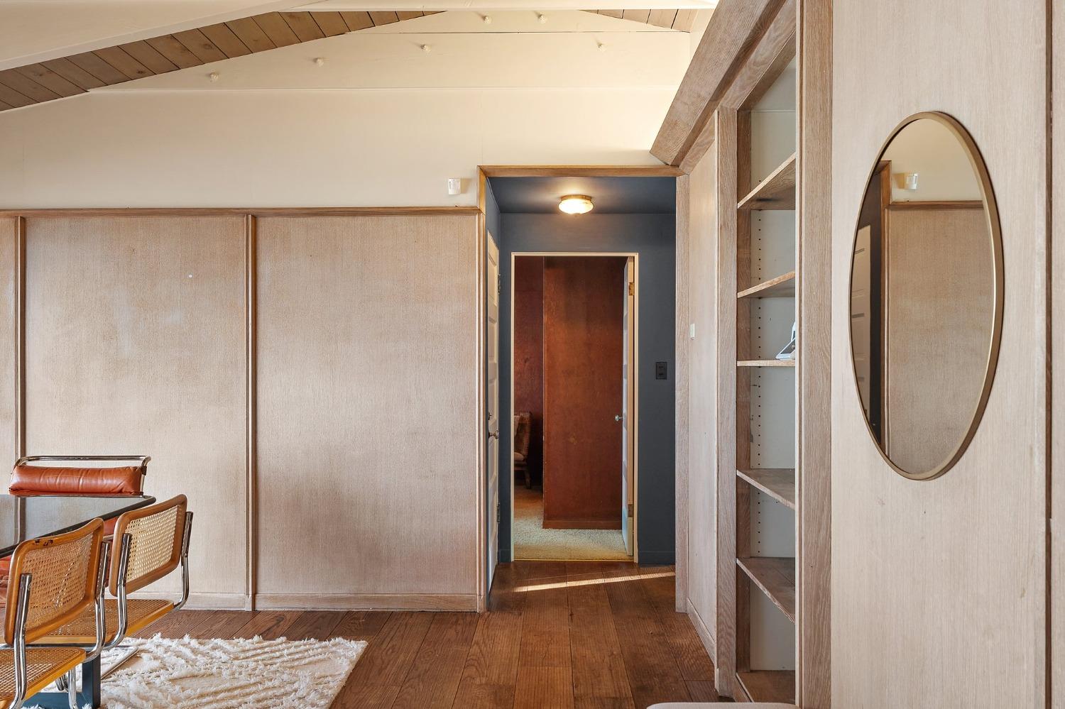 42 Circle Drive Dune Acres, IN 46304 - Photo 19 of 44 a view of a livingroom with wooden floor and entryway
