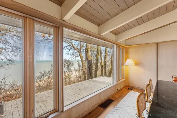 a kitchen with a window a sink and cabinets
