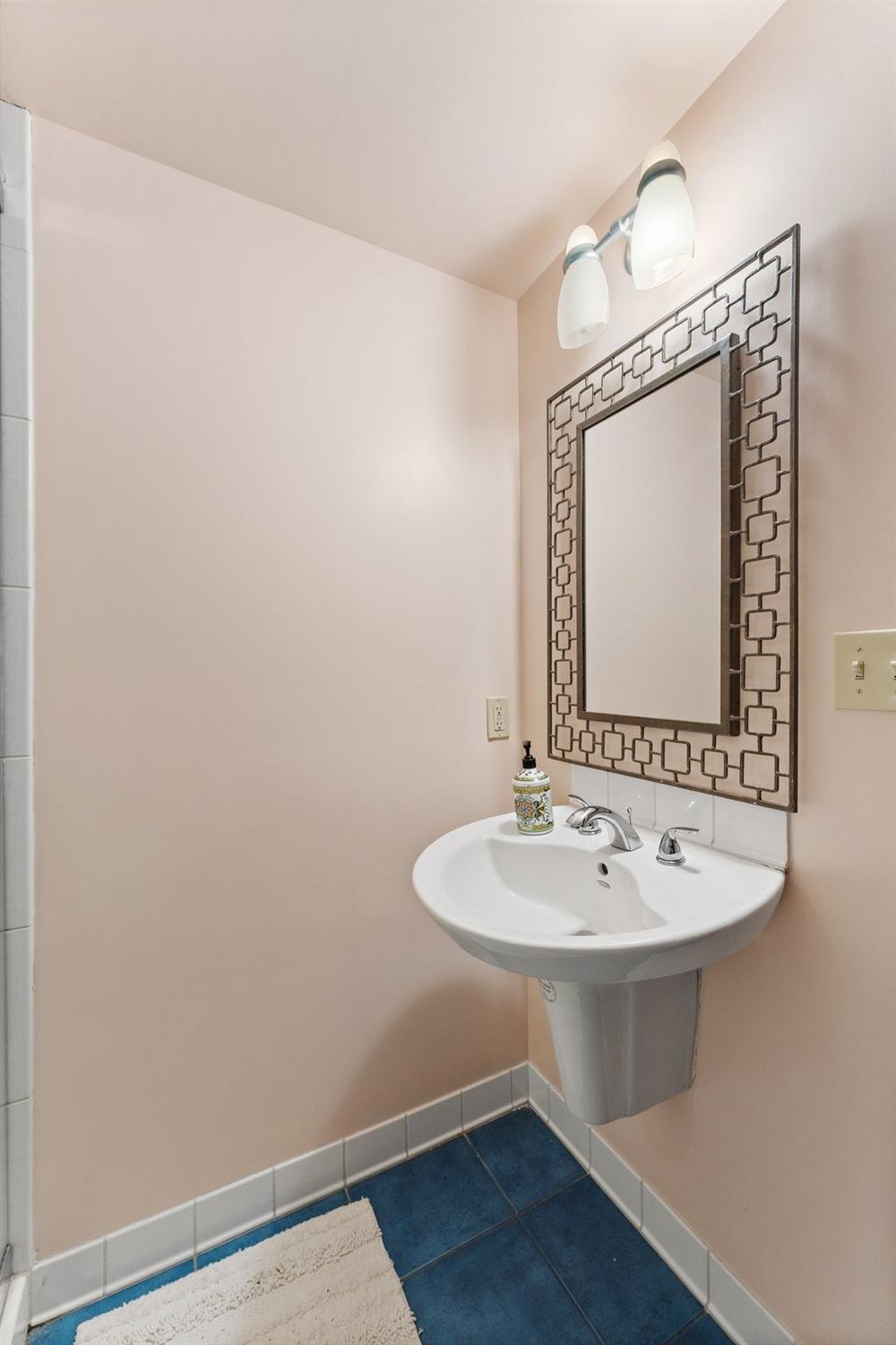 42 Circle Drive Dune Acres, IN 46304 - Photo 44 of 44 a bathroom with a sink and a mirror