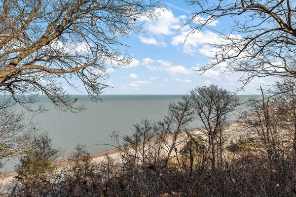 a view of a backyard of the house