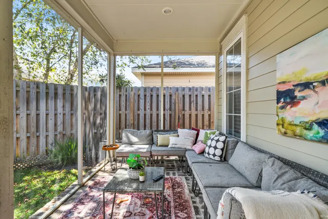 a outdoor living space with furniture and a garden