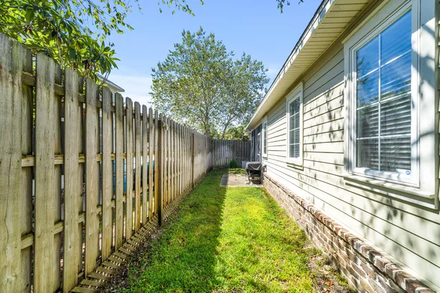 a view of a back yard of the house