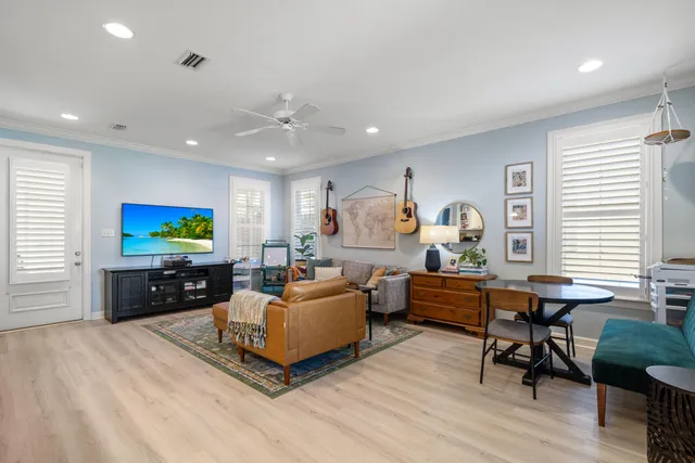 a living room with fireplace furniture and a flat screen tv