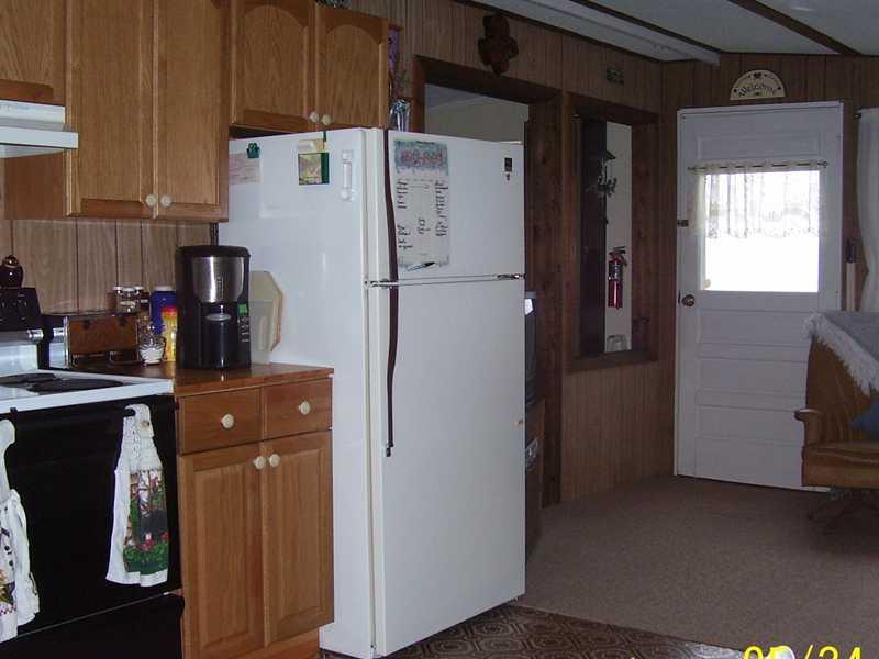 194 Cedar Lake Road Millinocket, ME 04462 - Photo 5 of 30 Kitchen. A spacious kitchen with all...
