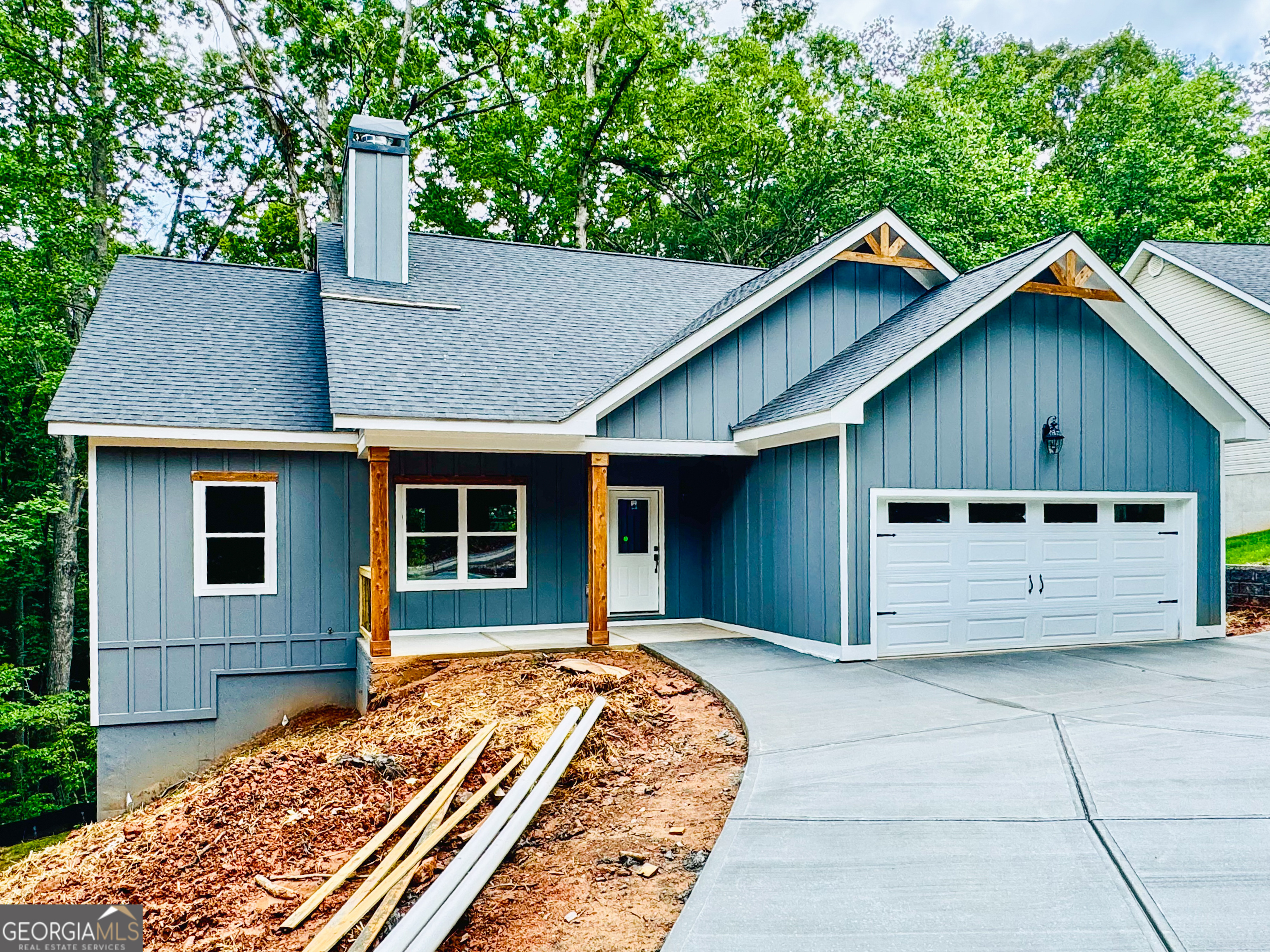 169 View Street Clarkesville, GA 30523 - Photo 1 of 1 a view of a house with a backyard