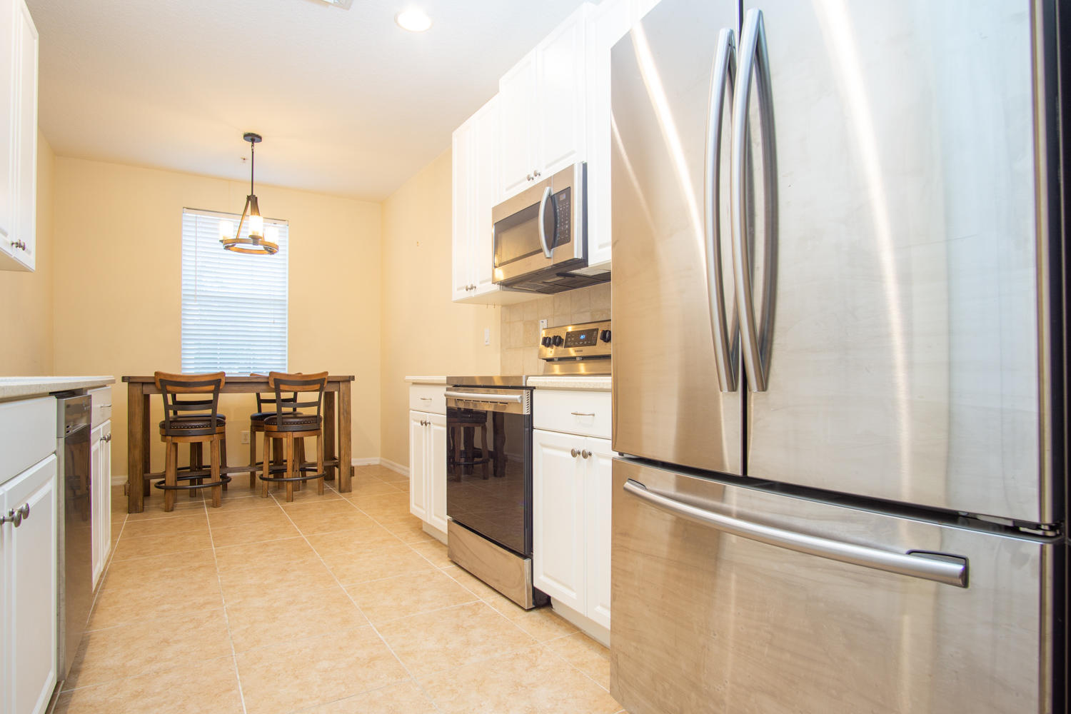 1549 Frederick Small Road Jupiter, FL 33458 - Photo 4 of 36 Kitchen/Dining
