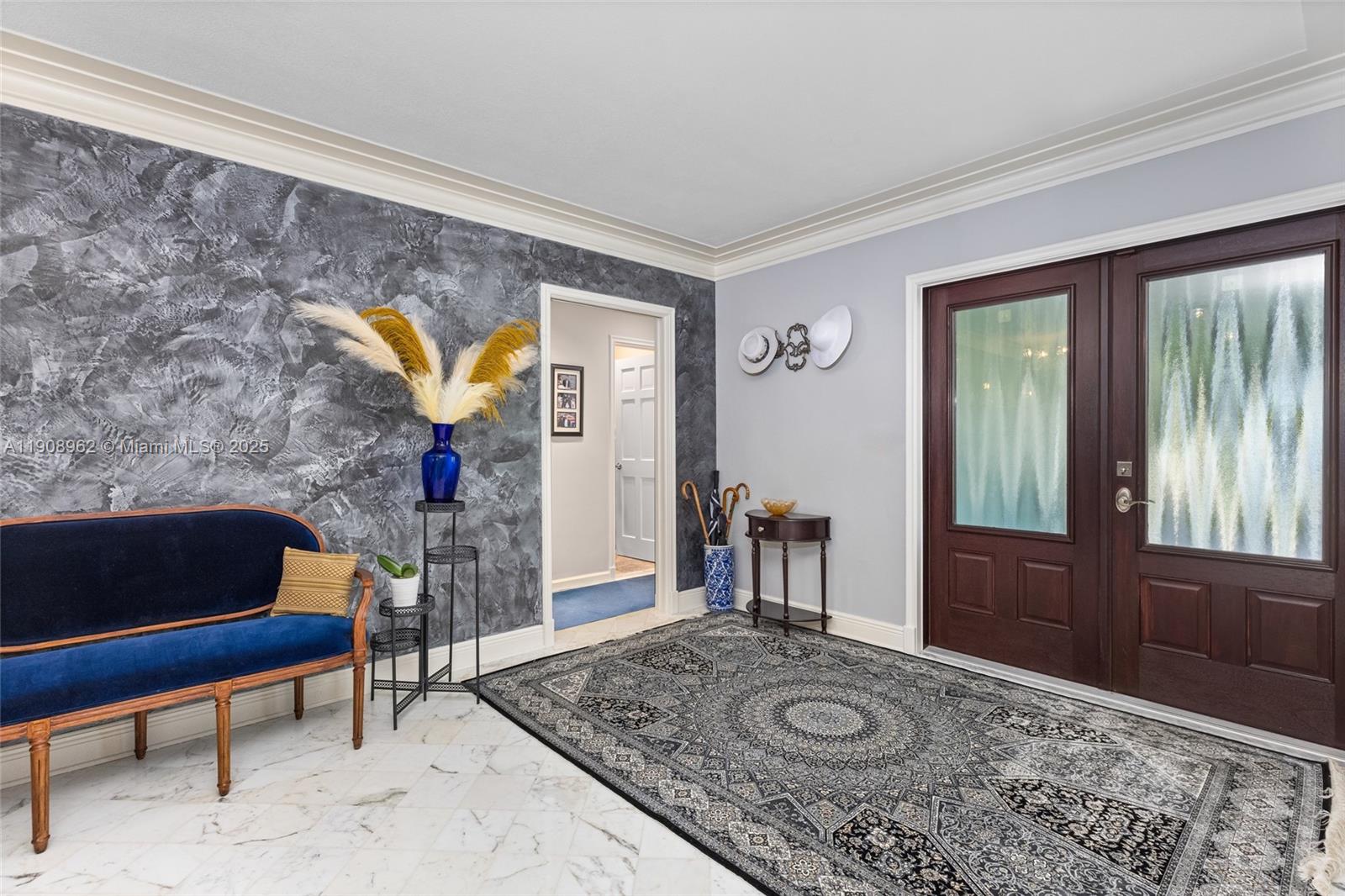 70 Bay Colony Lane Fort Lauderdale, FL 33308 - Photo 15 of 97 a living room with furniture and a rug