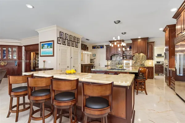 a view of a lake with boats and trees in the background