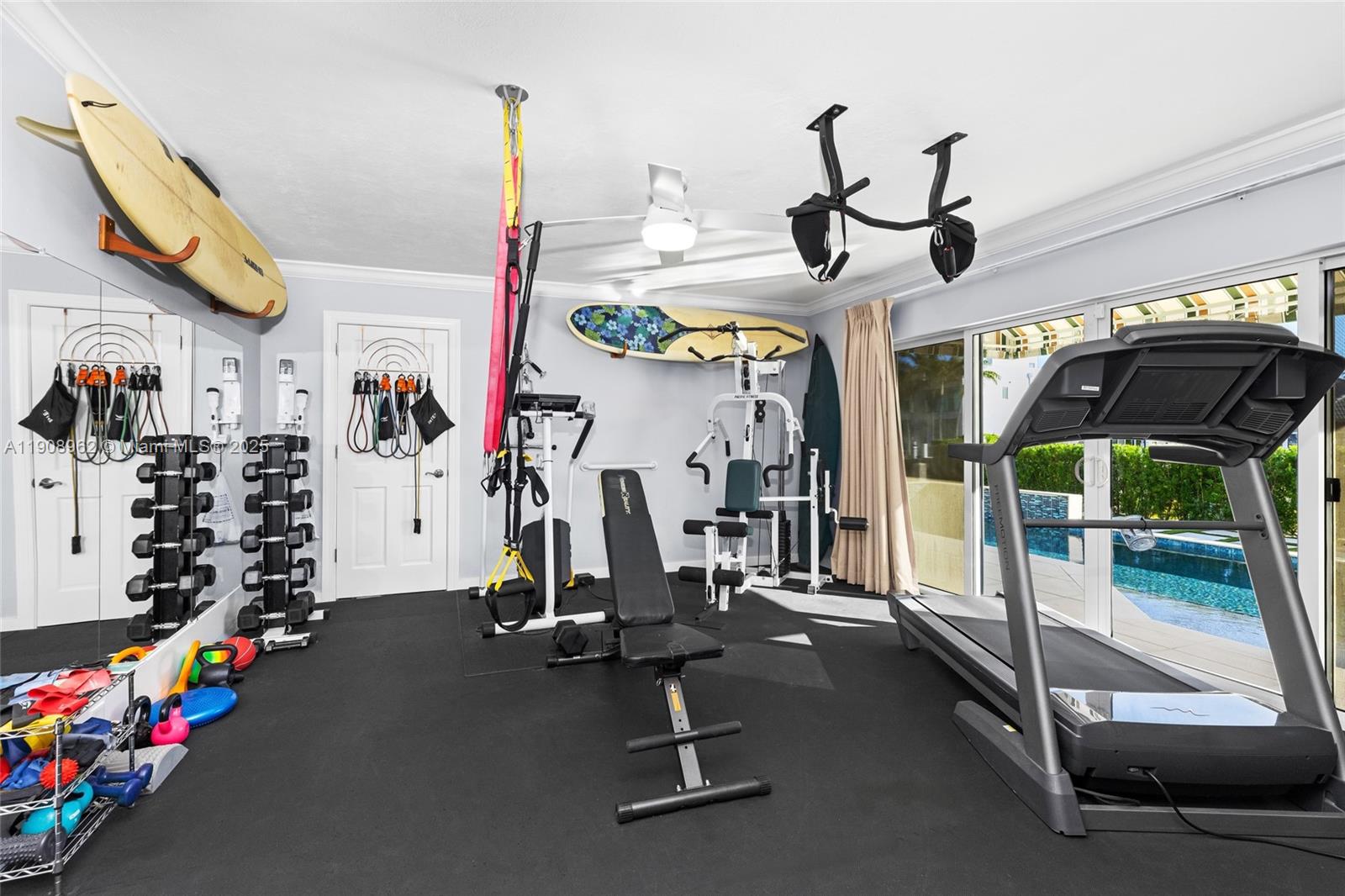 70 Bay Colony Lane Fort Lauderdale, FL 33308 - Photo 40 of 97 a room with lots of gym equipment