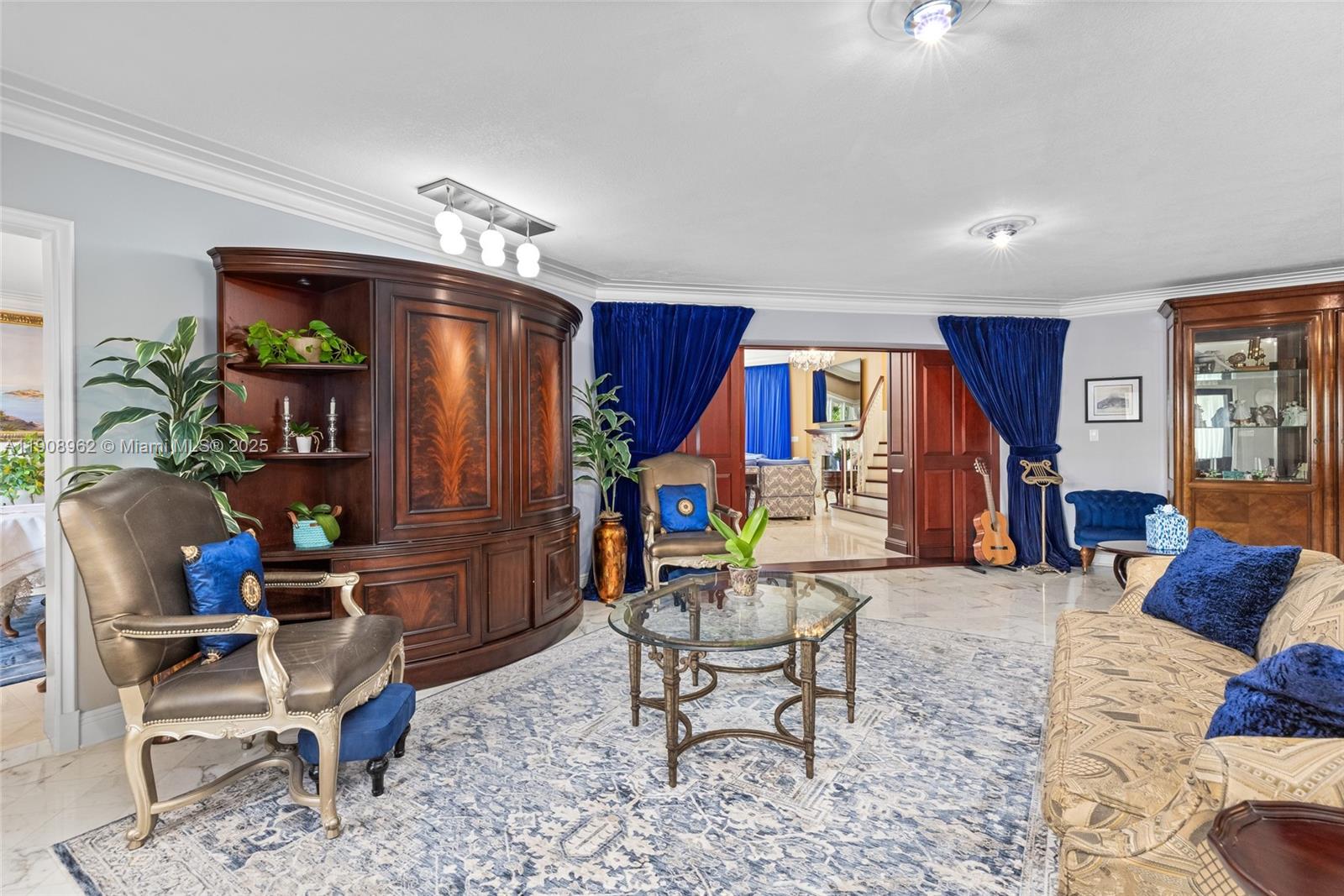 70 Bay Colony Lane Fort Lauderdale, FL 33308 - Photo 43 of 97 a living room filled with furniture and a wooden floor