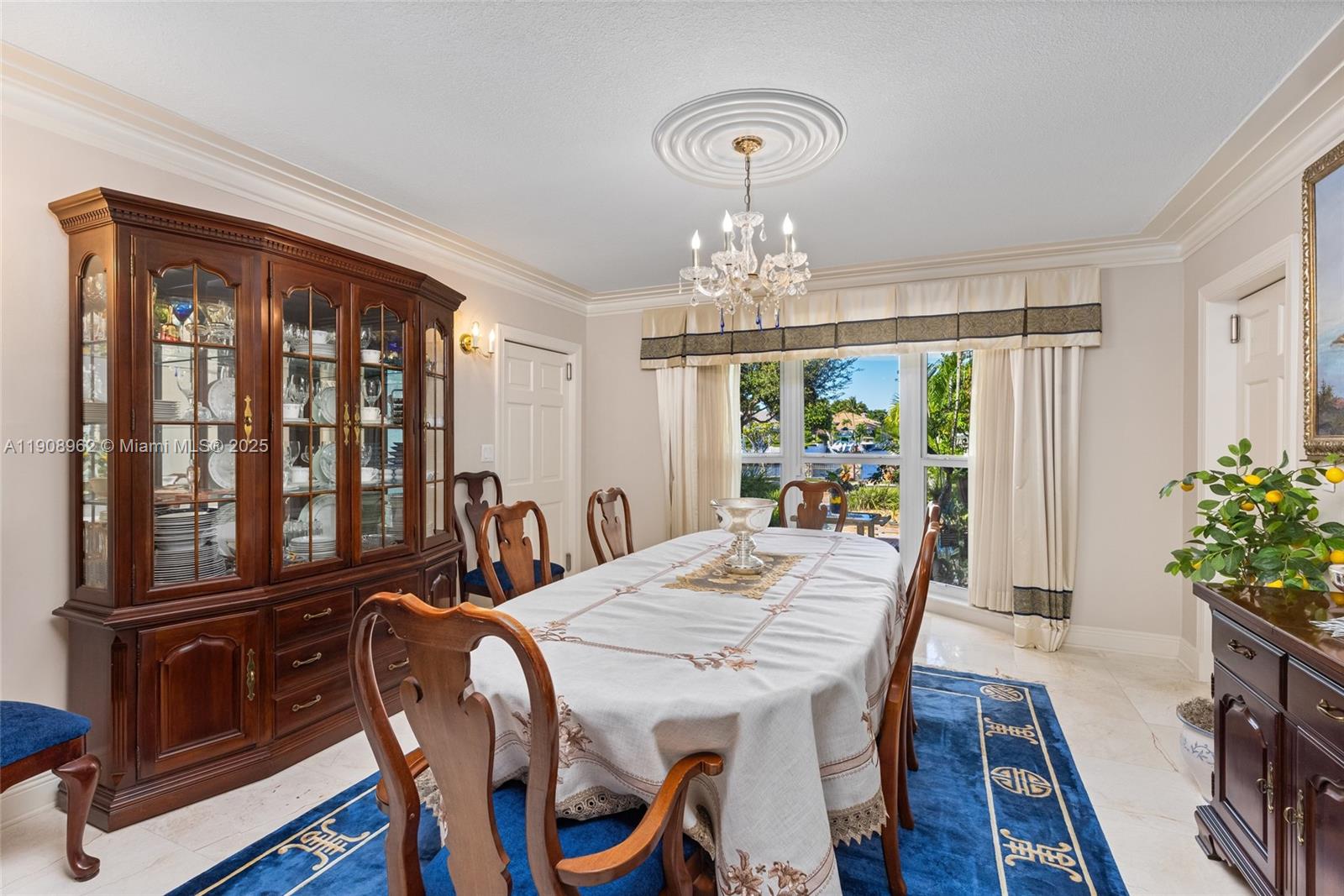 70 Bay Colony Lane Fort Lauderdale, FL 33308 - Photo 46 of 97 a view of a dining room with furniture window and wooden floor