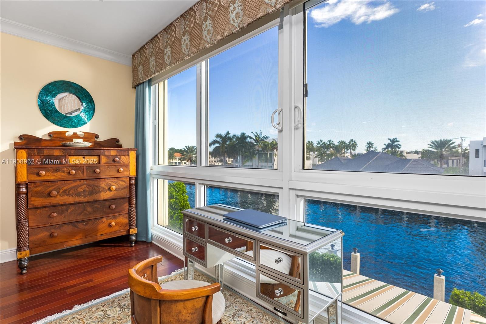 70 Bay Colony Lane Fort Lauderdale, FL 33308 - Photo 69 of 97 a living room with chair and a table