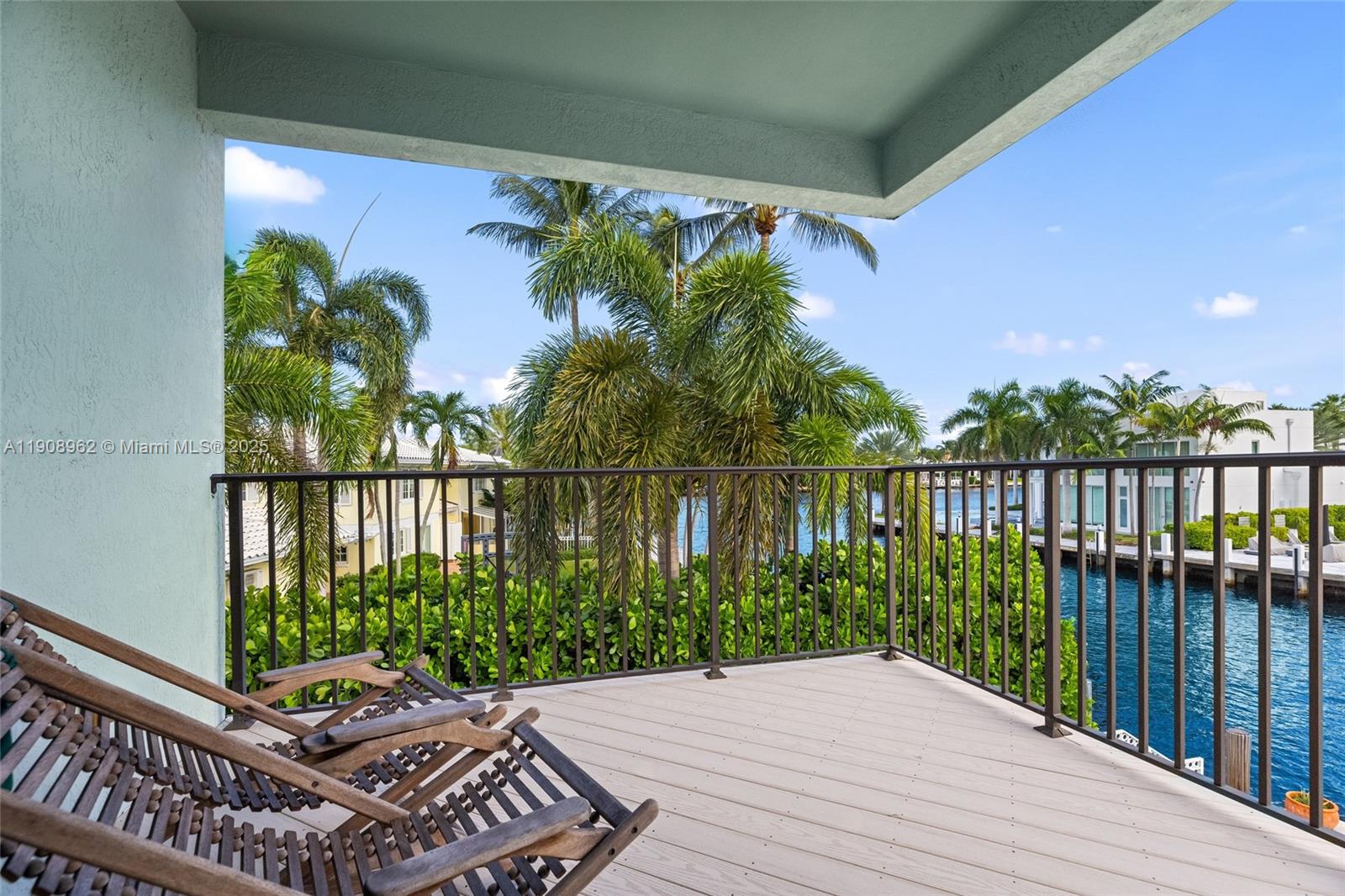 70 Bay Colony Lane Fort Lauderdale, FL 33308 - Photo 73 of 97 a view of a balcony with wooden floor