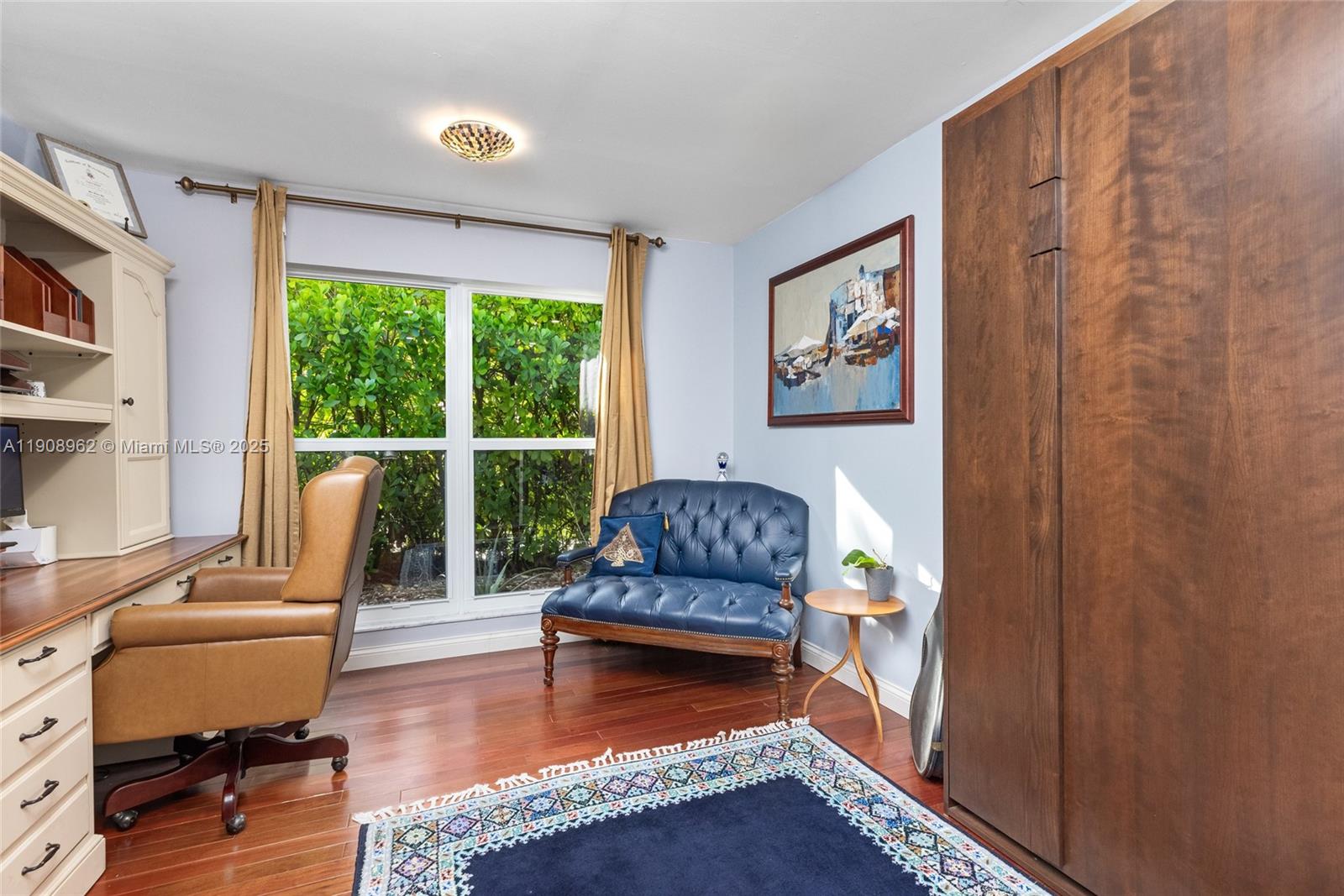 70 Bay Colony Lane Fort Lauderdale, FL 33308 - Photo 78 of 97 a living room with furniture and a large window