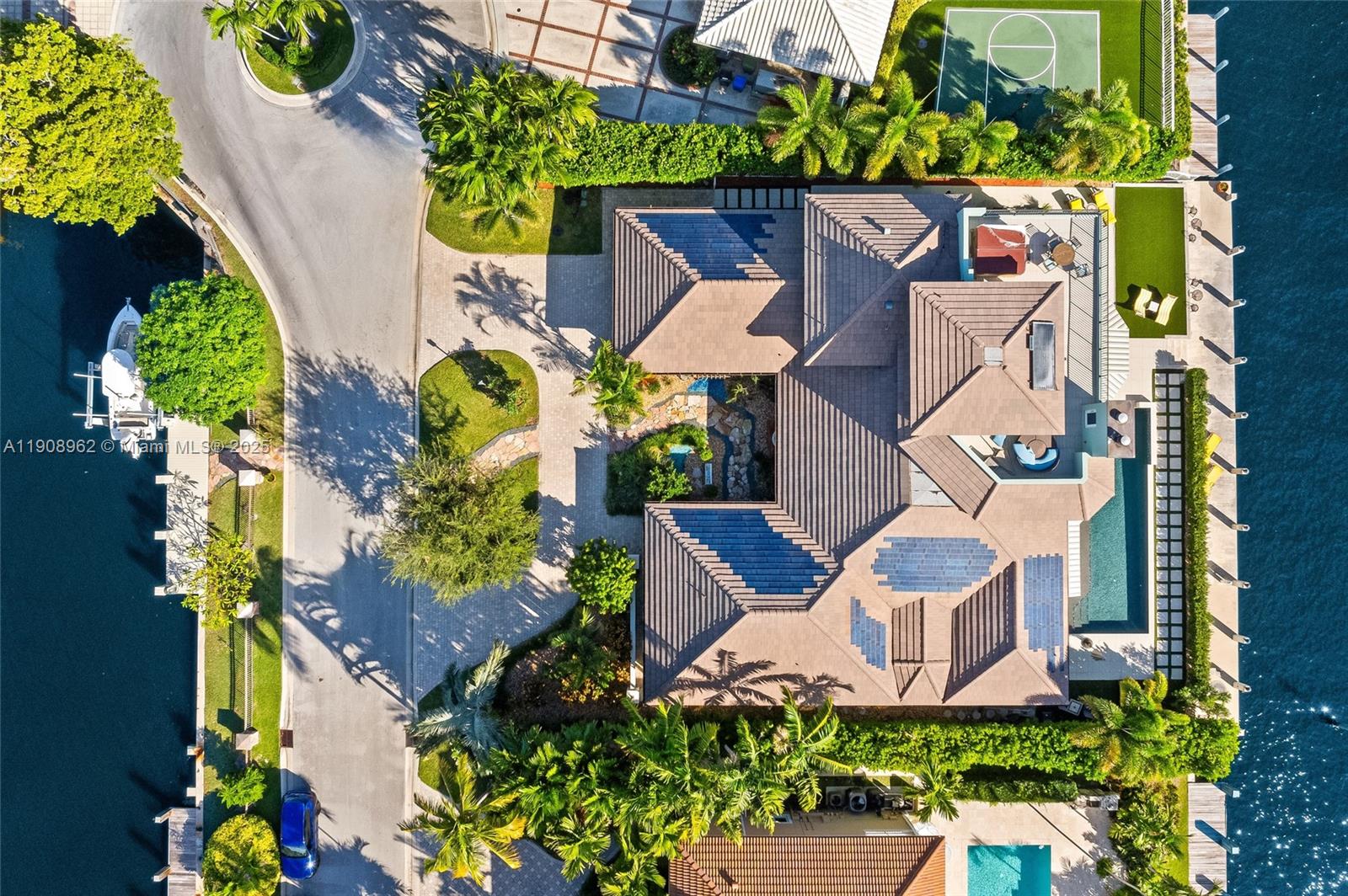 70 Bay Colony Lane Fort Lauderdale, FL 33308 - Photo 8 of 97 an aerial view of a house with a yard and garden