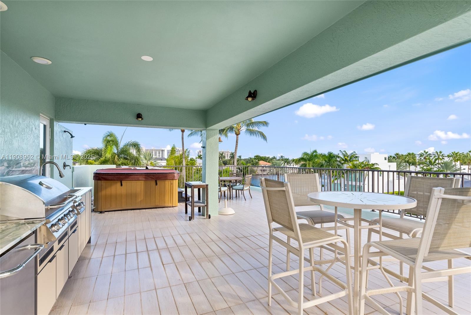 70 Bay Colony Lane Fort Lauderdale, FL 33308 - Photo 87 of 97 a dining room with furniture and a kitchen view