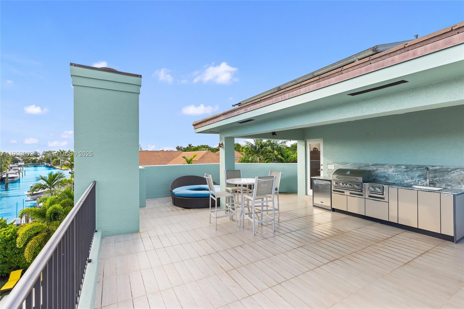 70 Bay Colony Lane Fort Lauderdale, FL 33308 - Photo 89 of 97 a outdoor space with a large window and chairs