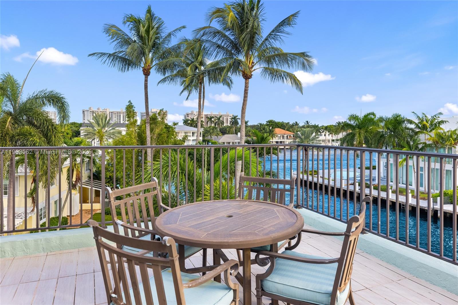 70 Bay Colony Lane Fort Lauderdale, FL 33308 - Photo 91 of 97 a view of a chairs and table on the roof deck