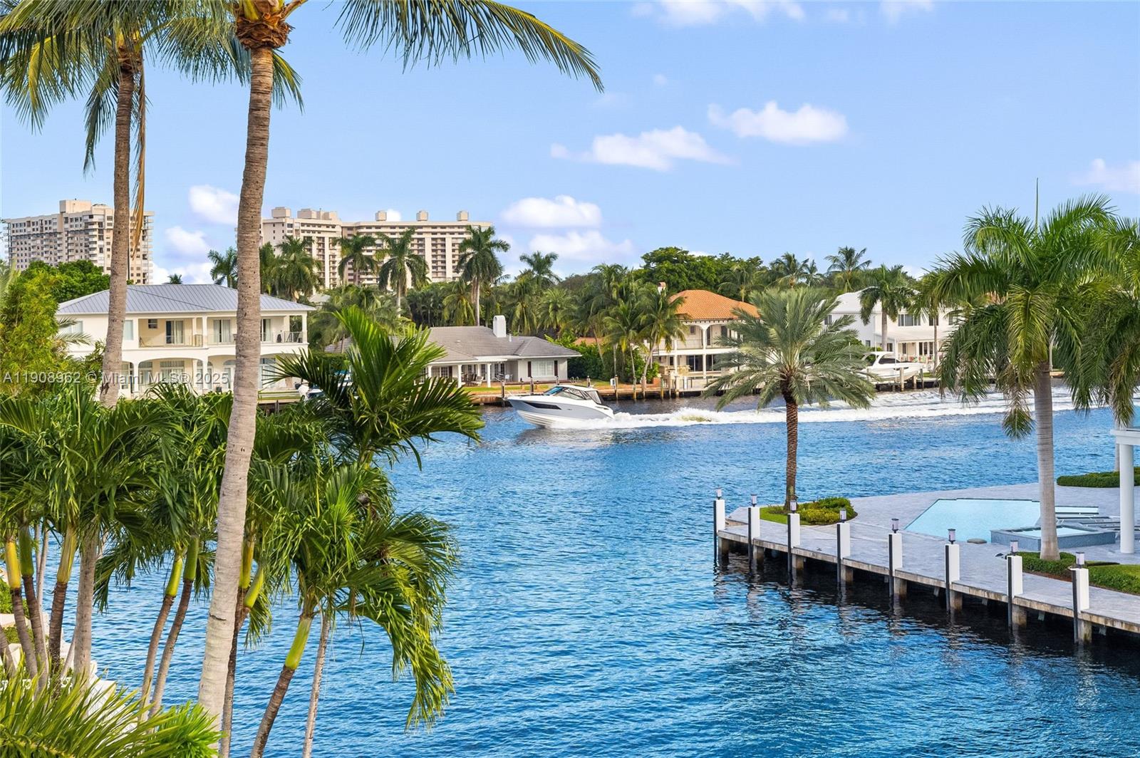 70 Bay Colony Lane Fort Lauderdale, FL 33308 - Photo 92 of 97 a swimming pool with outdoor seating