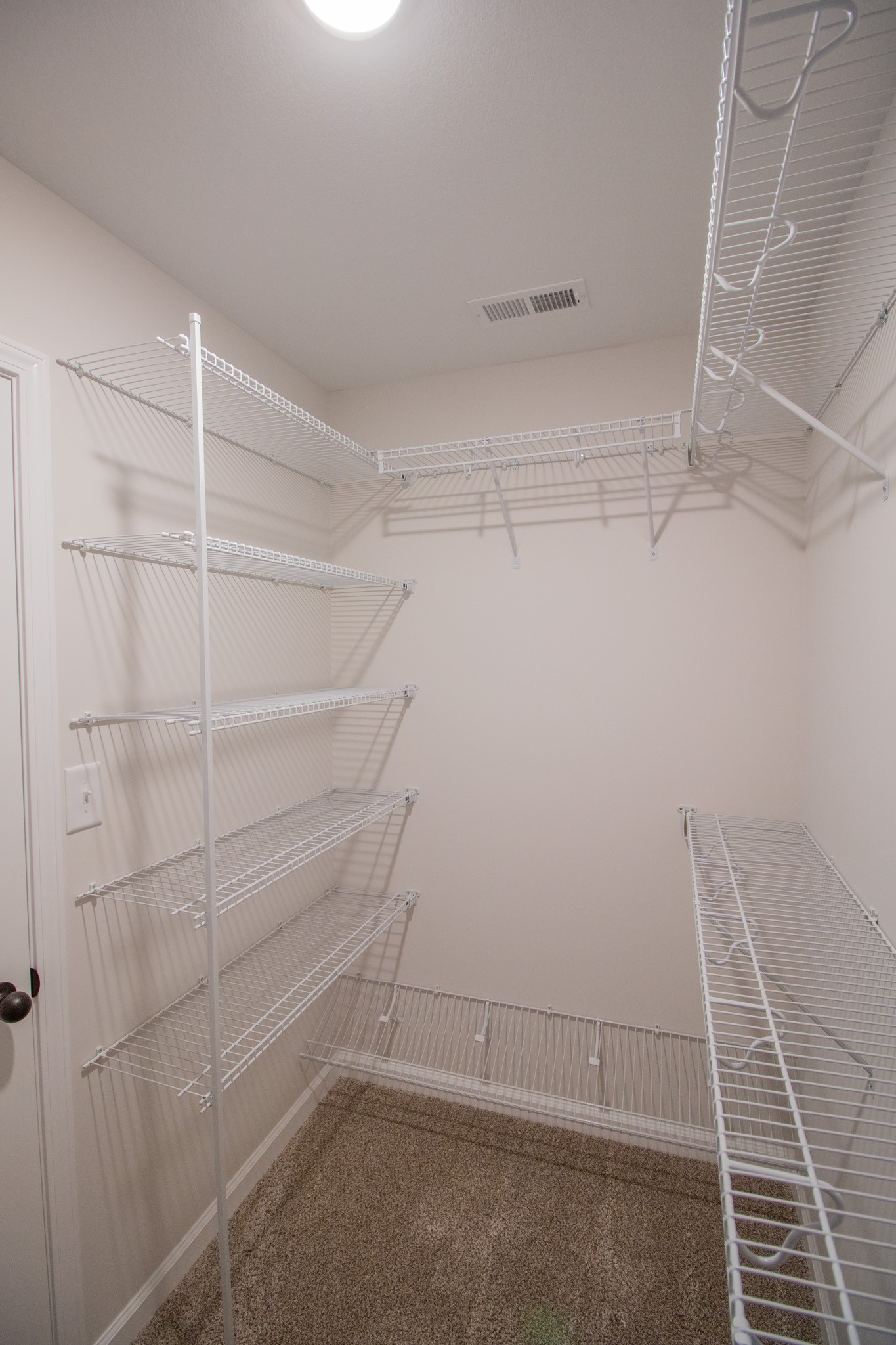 362 Timber Springs Clarksville, TN 37042 - Photo 16 of 24 a view of a room with racks on the wall