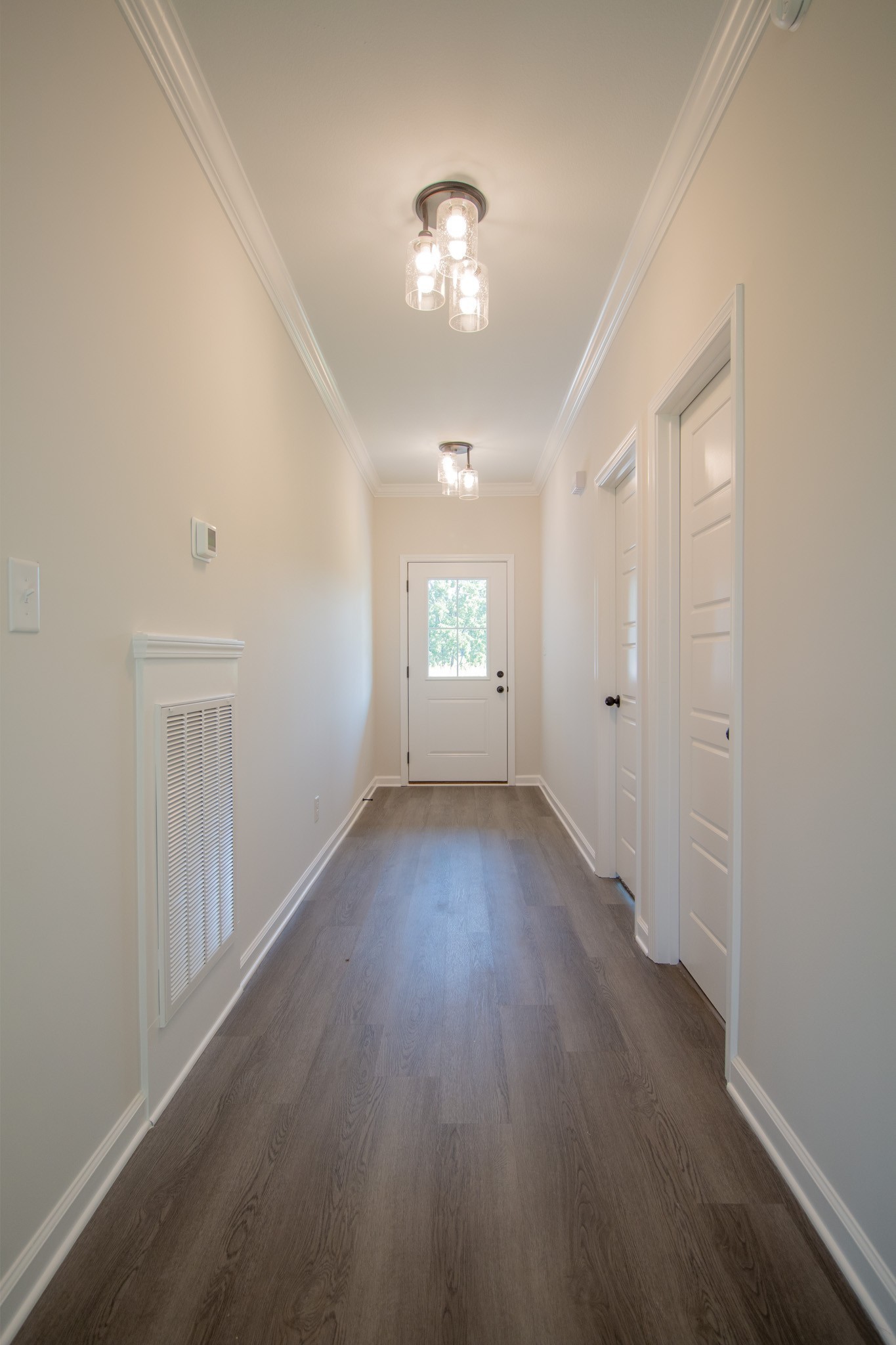 362 Timber Springs Clarksville, TN 37042 - Photo 3 of 24 wooden floor in an empty room with a window