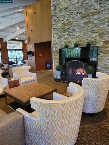 a view of swimming pool with seating area