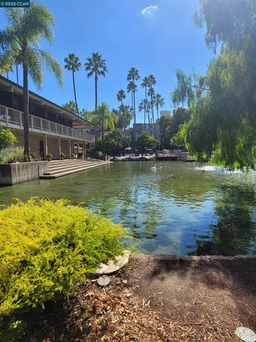a view of a lake with a big yard