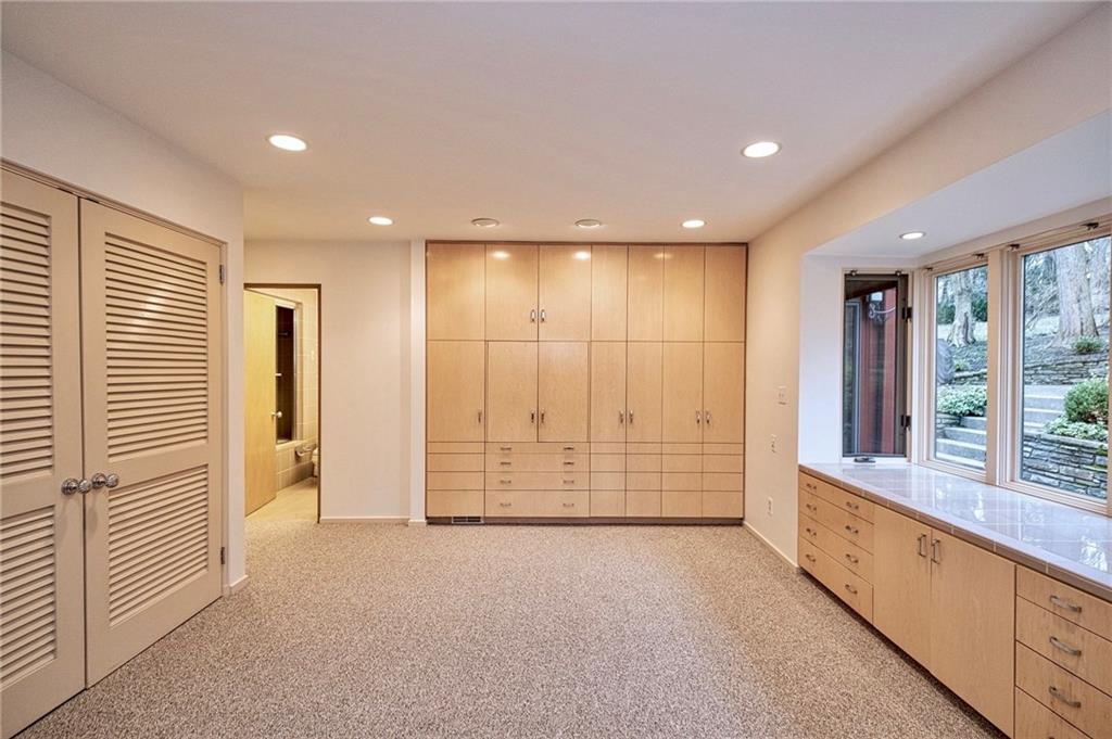 788 Elm Spring Road Pittsburgh, PA 15243 - Photo 16 of 25 Fabulous master suite with walls of closets and built-in cabinets and drawers. Just move in the bed!! New carpeting is already here!
