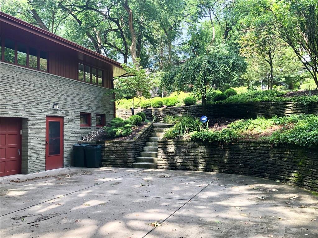 788 Elm Spring Road Pittsburgh, PA 15243 - Photo 3 of 25 Wide driveway, bordered by lovely stone walls, has plenty of parking space, and leads to the spacious 3-car garage.