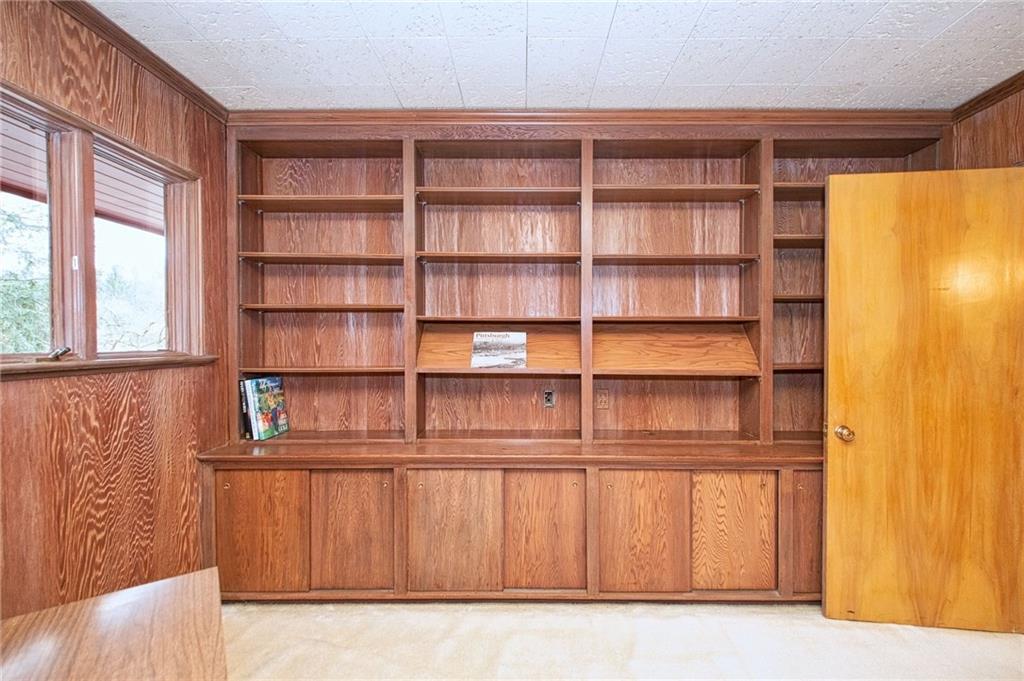 788 Elm Spring Road Pittsburgh, PA 15243 - Photo 21 of 25 4th bedroom could also be great office, with its wall of shelves and cabinets.