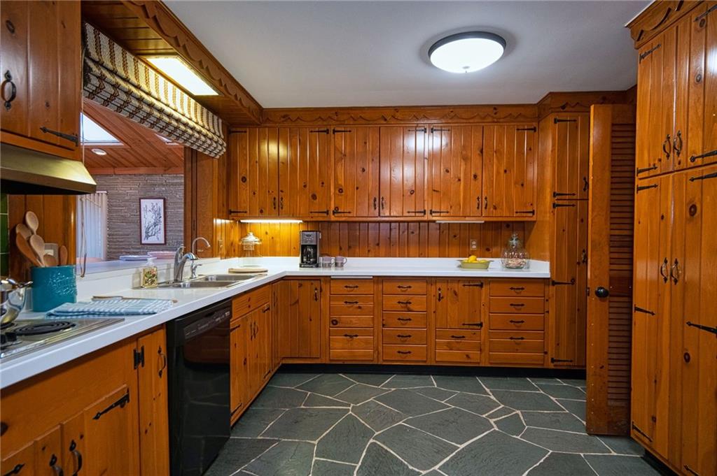 788 Elm Spring Road Pittsburgh, PA 15243 - Photo 10 of 25 Immaculate kitchen with abundant cabinets and generous counter space. Beautiful slate floor extends to front foyer.