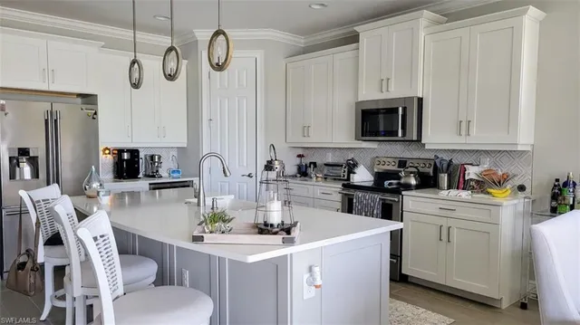 $995,000 | 14691 Stillwater Way, Naples, FL 34114