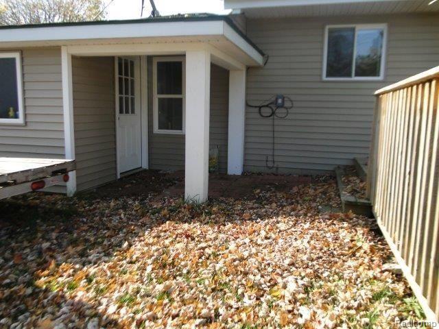 950 North Wilder Road Lapeer, MI 48446 - Photo 27 of 32 Garage Back Door