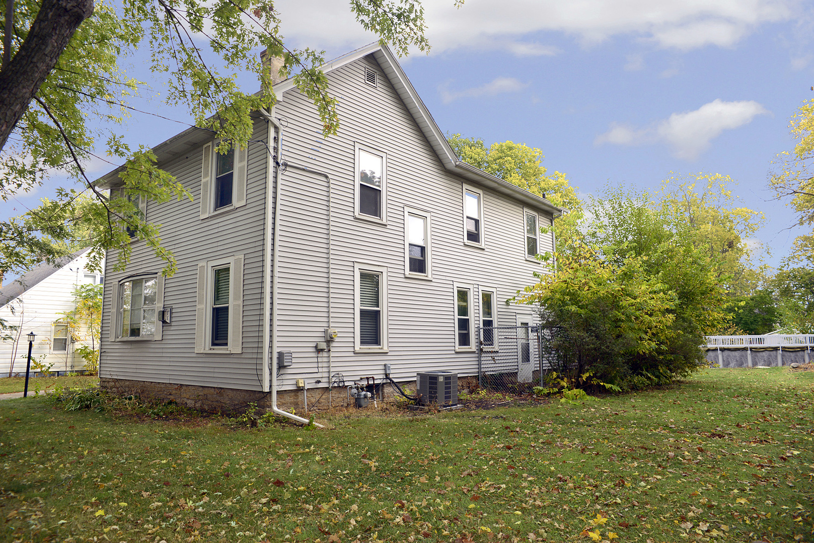 1050 State Street Ottawa, IL 61350 - Photo 19 of 25 a view of a house with a backyard