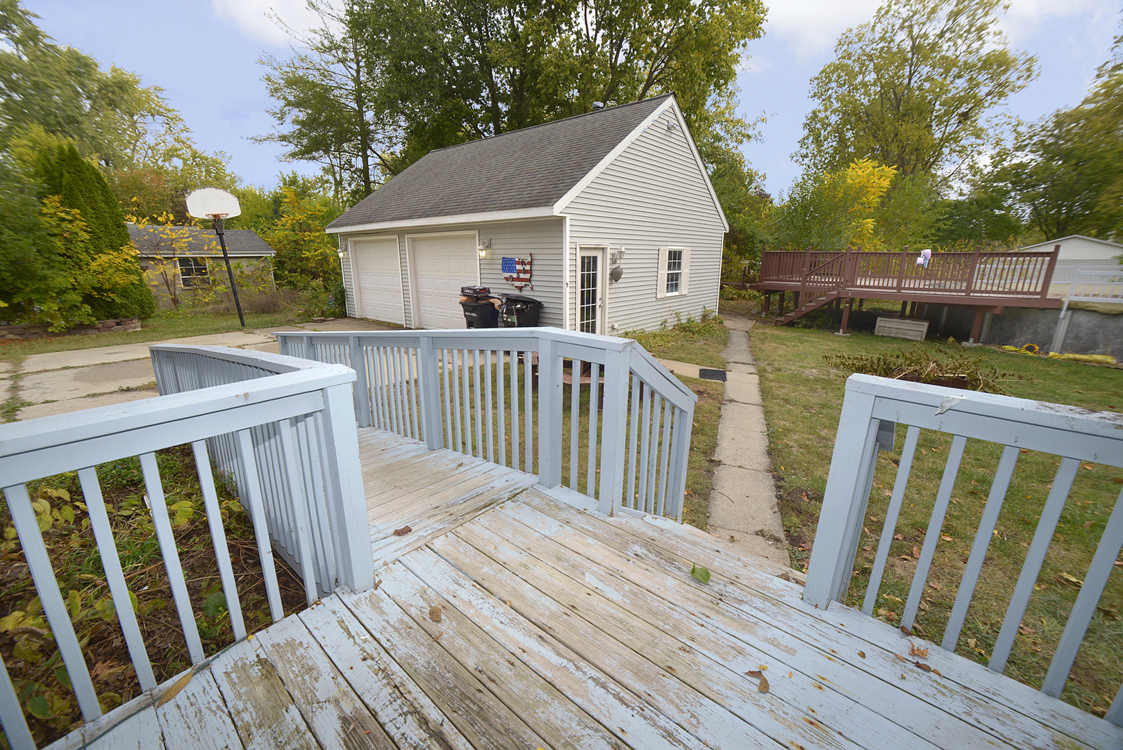 1050 State Street Ottawa, IL 61350 - Photo 20 of 25 a view of a house with wooden deck
