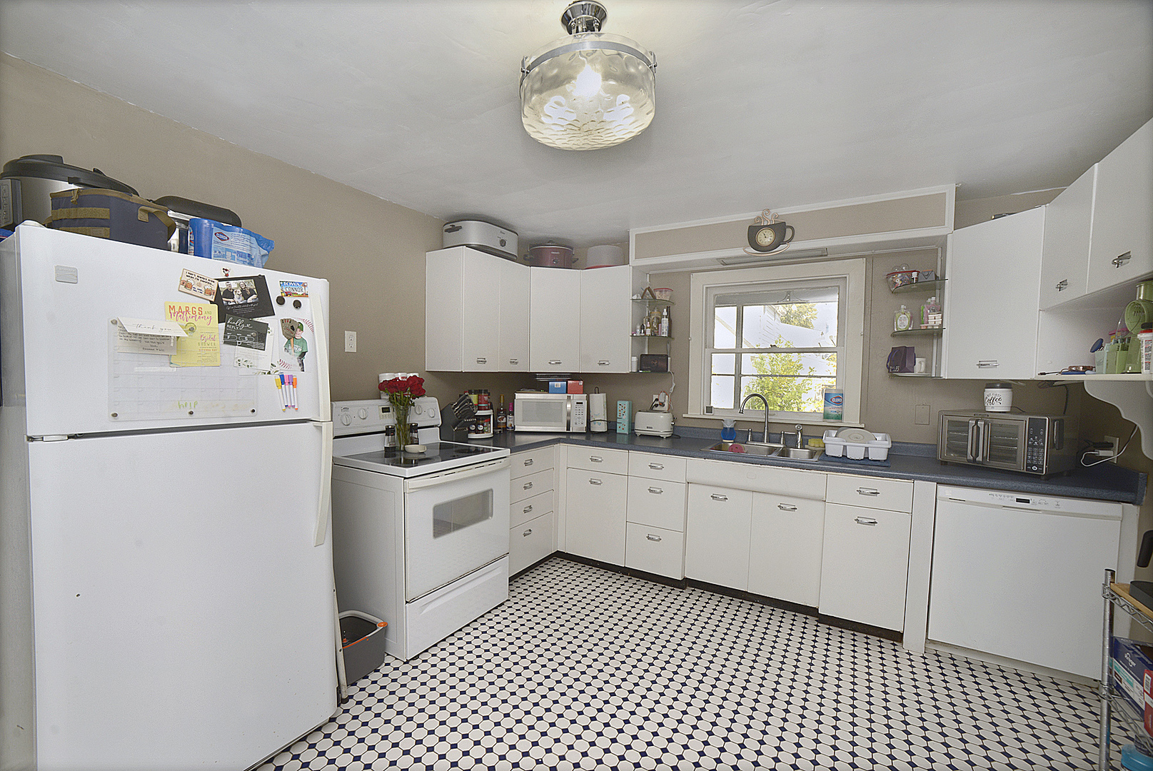 1050 State Street Ottawa, IL 61350 - Photo 2 of 25 a kitchen with granite countertop appliances a sink and a window