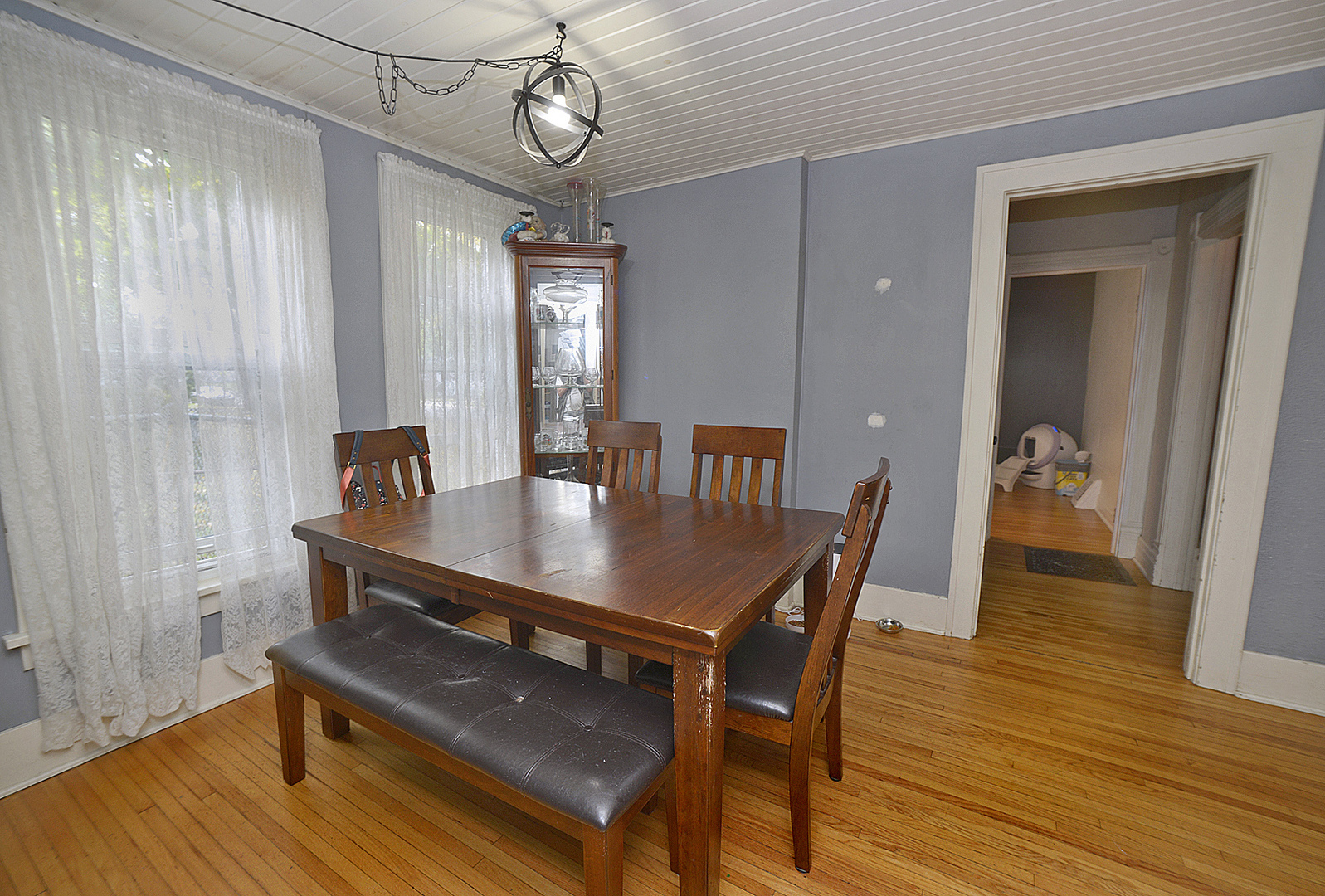1050 State Street Ottawa, IL 61350 - Photo 4 of 25 a view of a dining room with furniture window and wooden floor