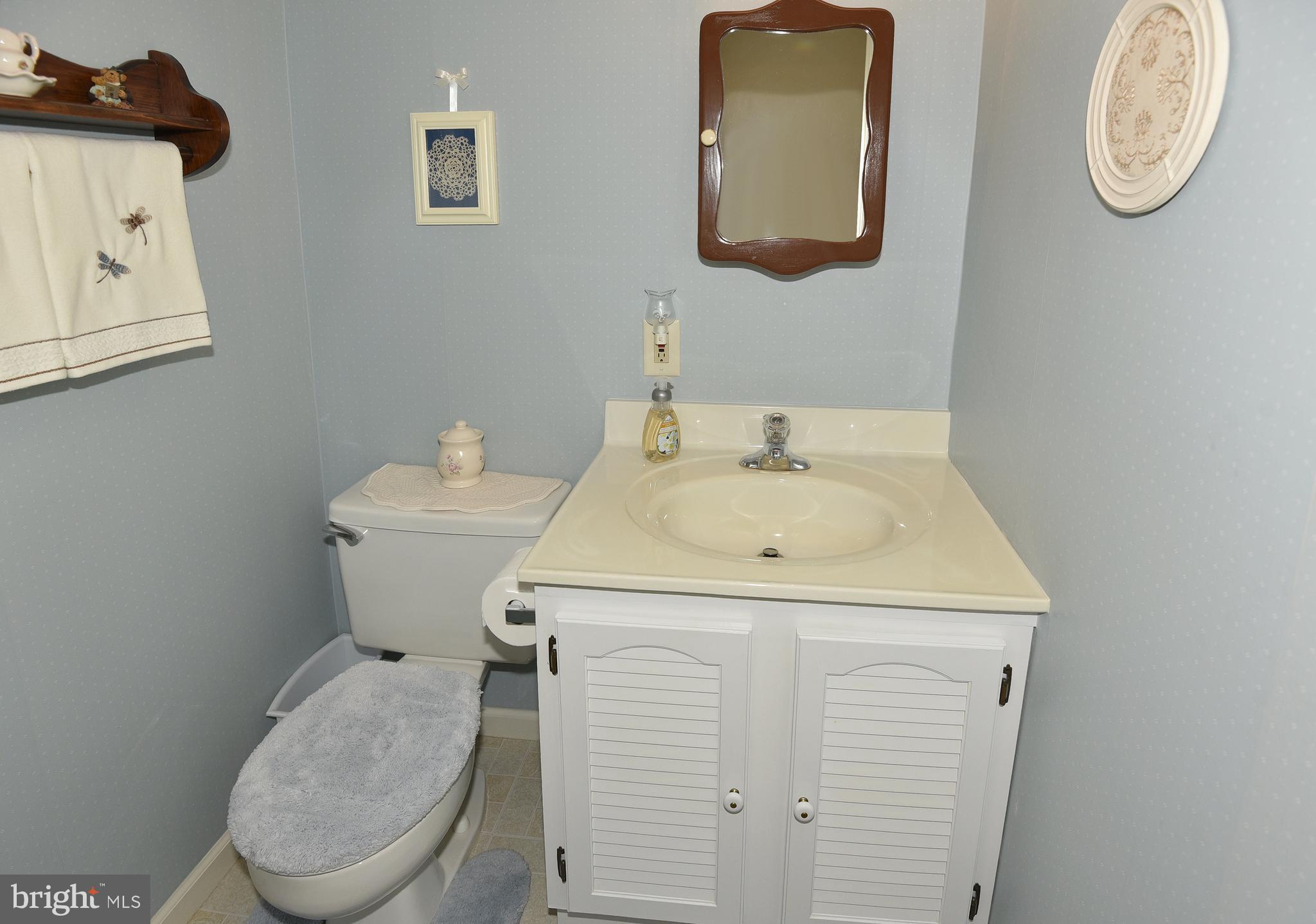 2909 Rockingham Court Pasadena, MD 21122 - Photo 15 of 49 Powder room on the main level
