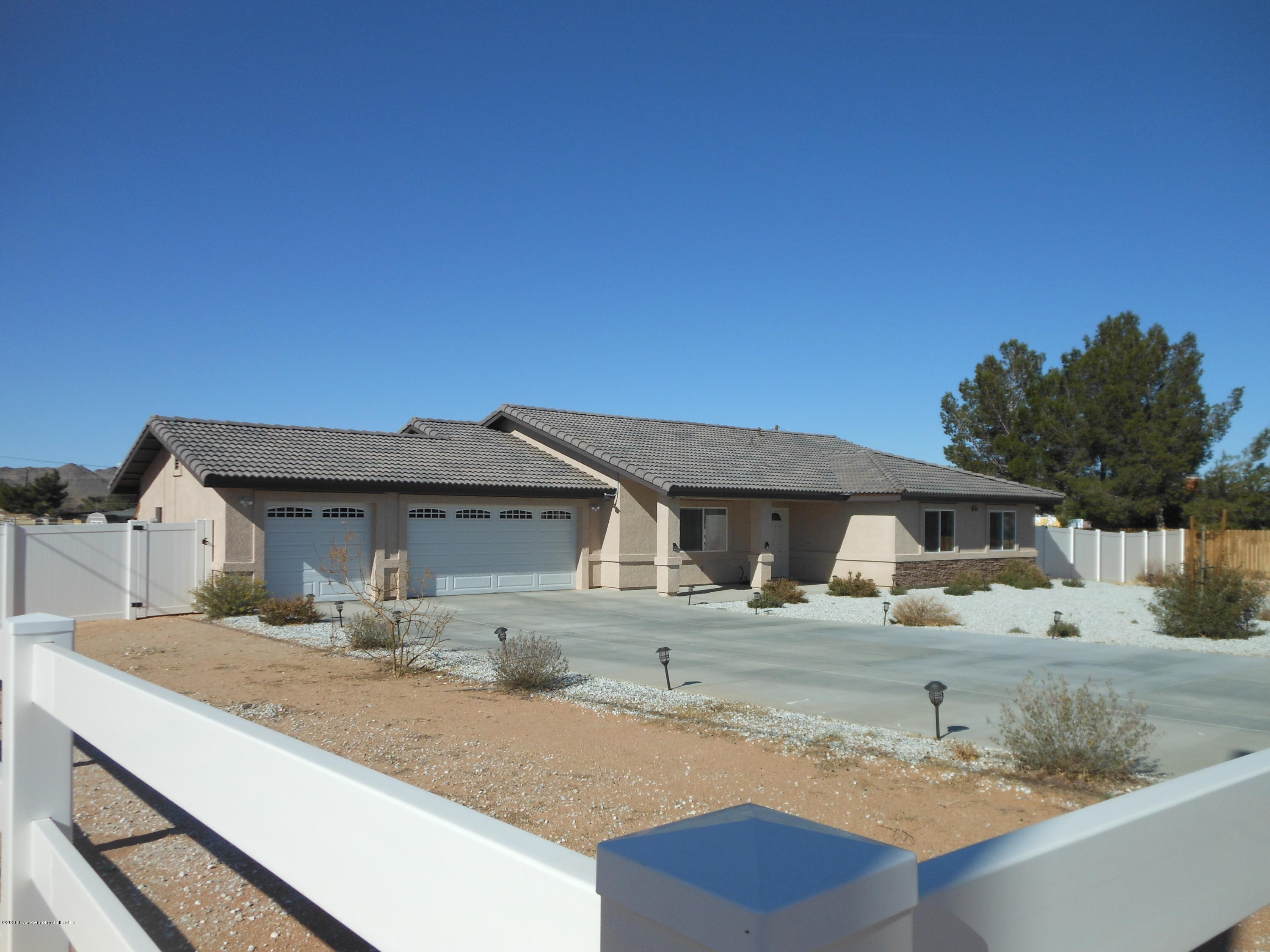 14806 Cheyenne Road Apple Valley, CA 92307 - Photo 1 of 15 a house view with a outdoor space