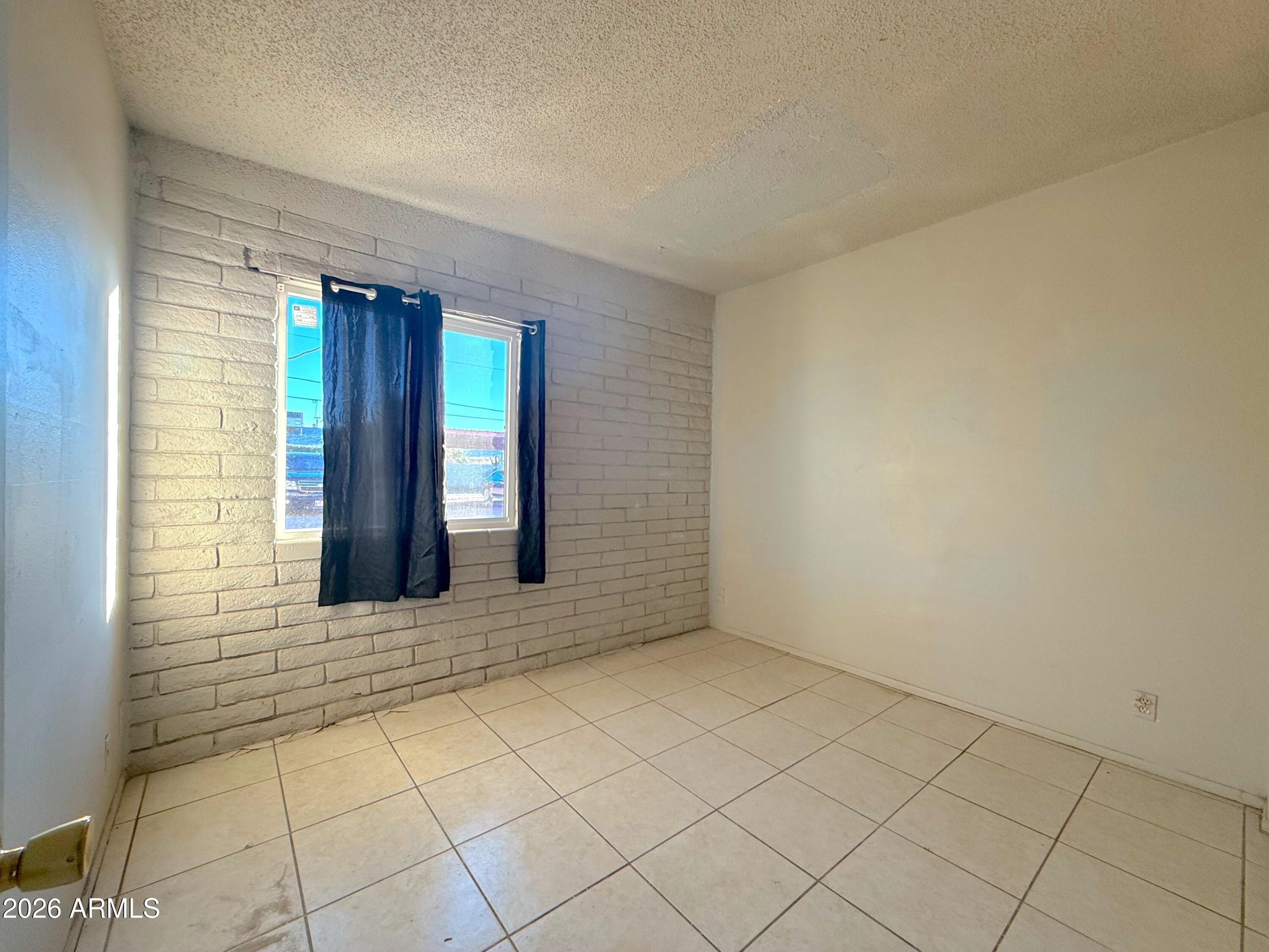 433 West Ray Road, Unit C Chandler, AZ 85225 - Photo 6 of 7 a view of an entrance of house