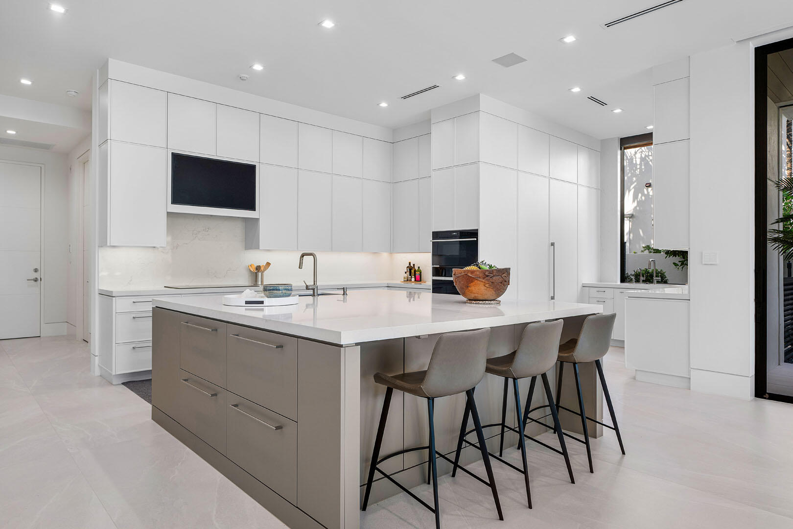175 Alexander Palm Road Boca Raton, FL 33432 - Photo 15 of 71 a kitchen with a sink cabinets and wooden floor